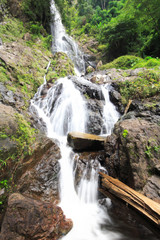 high waterfall in forest