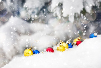 Christmas balls on snow