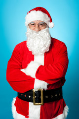 Confident aged male in Santa costume