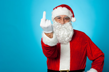 Agitated Santa showing his middle finger