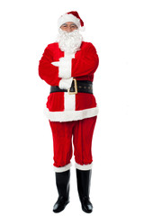 Confident old man in Santa costume