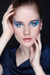 Beauty woman portrait of teen girl with eyes make up, fashion st