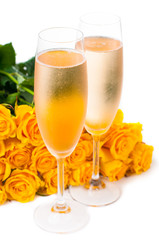 champagne and a large bouquet of roses