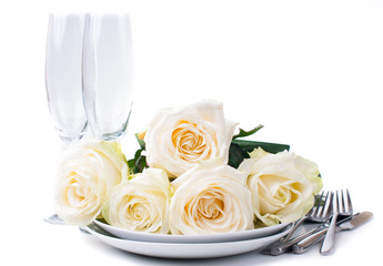 Festive table setting with roses