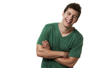Young handsome male model laughing posing white background studi