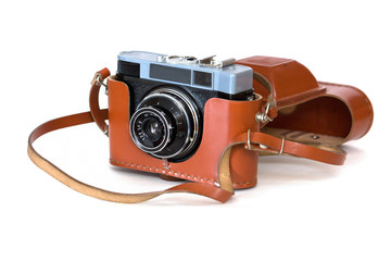 Old film camera with a case on the white background