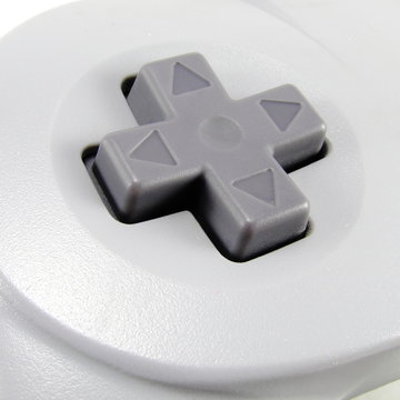 Four way video game controller pad