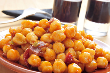 spanish garbanzos con jamon, chickpeas with serrano ham, served