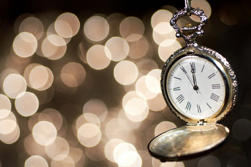 New year clock on abstract background