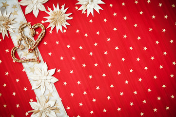 Christmas background with decorations on a red background