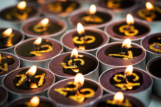 Detail of brown burning candles from advent calendar
