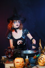 Sexy witch on a dark background