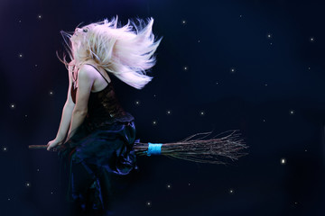 blond witch flying on broom