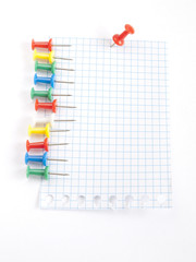 Blank sheet of paper with thumbtack