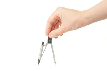 Hand with compass on a white background