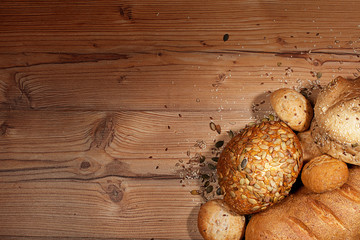 Obraz na płótnie Canvas white bread over wooden background