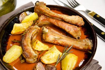 Pork ribs with baked potatoes
