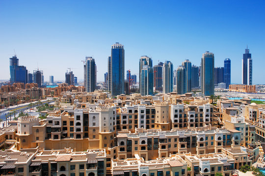 Downtown Dubai is dwarfed by the tall towers of Dubai's skyline