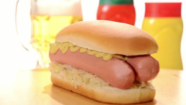 hotdog, mustard, ketchup and beer
