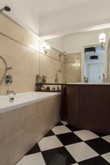 Bathroom with black and white tiles