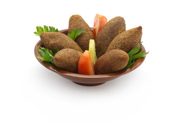 Lebanese food of fried kibe isolated on white