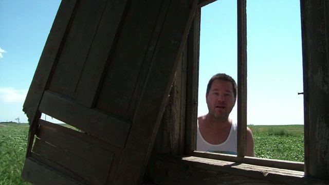 Man Knocks on Window in Country