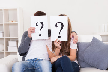 Couple with question marks