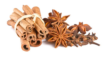 anise, cinammon and carnation isolated on white background
