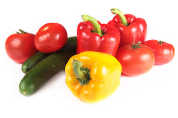 paprika, tomatoes and cucumber isolated on white