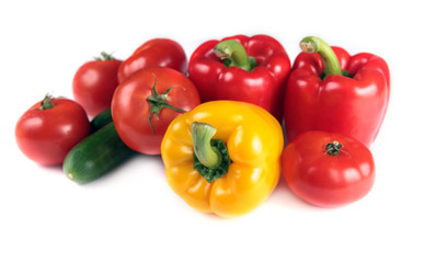 paprika, tomatoes and cucumber isolated on white