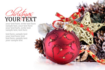 Christmas ornament with red ribbon, pine cones and star