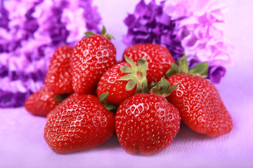 Strawberry in over violet background