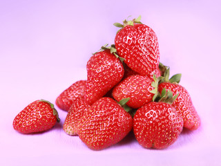 Strawberry in over violet background