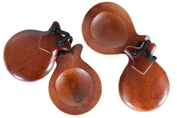 Two pair castanets on a white background