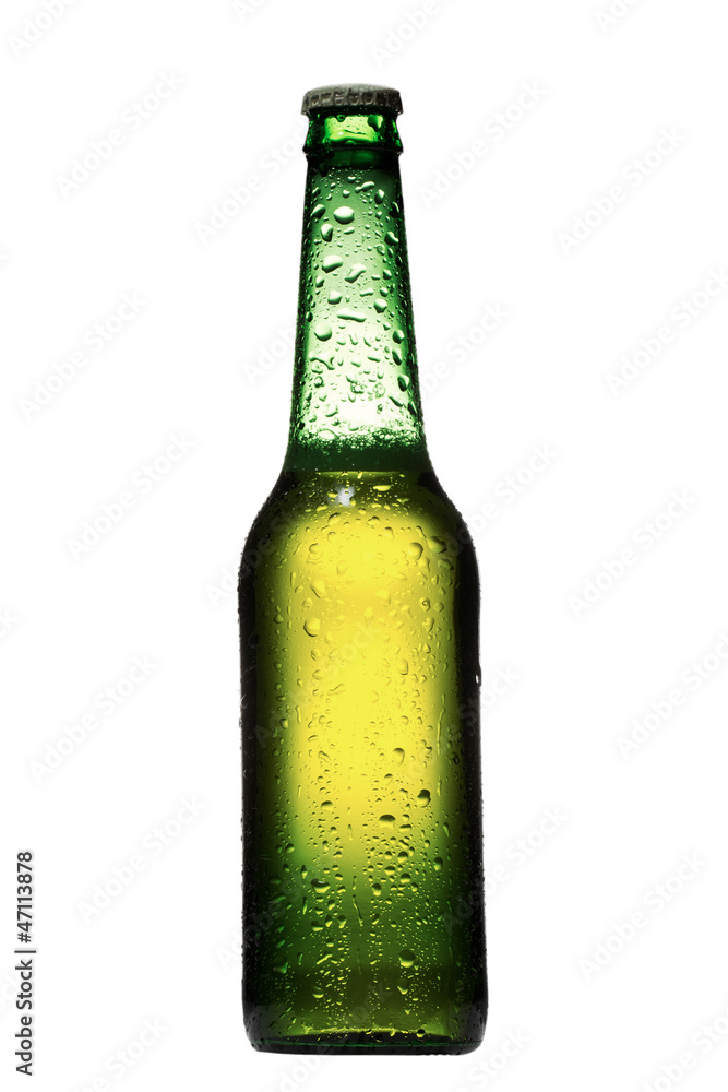 Wall mural Beer bottle with drops isolated on white