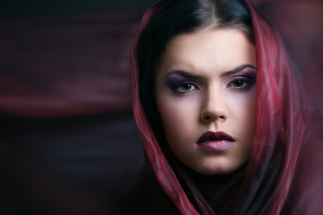 gorgeous woman with purple color scarf