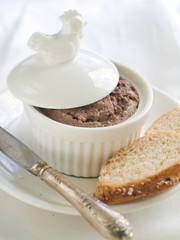 Chicken liver pate in ramekin, selective focus