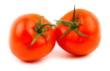 tomatoes with green leaves isolated on white background
