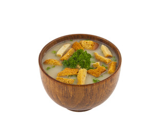 soup in a wooden bowl isolated