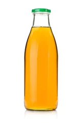 Photo sur Aluminium Jus Apple juice in a glass bottle
