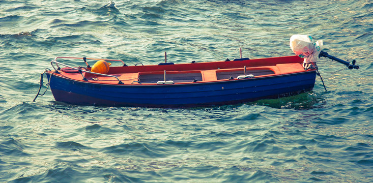 fisherman`s boat at sea water