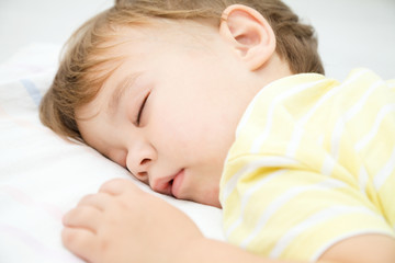 Cute little boy is sleeping