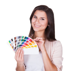 Attractive woman chooses a color scheme