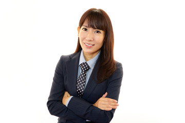 腕組をして微笑むオフィスレディー