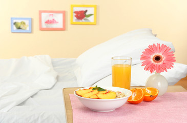 Fototapeta na wymiar light breakfast on the nightstand next to the bed