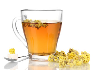 A cup of tea with immortelle isolated on white