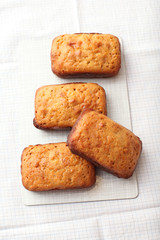 Home-made cakes on a tablecloth