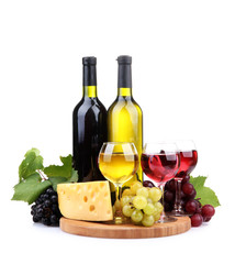 bottles and glasses of wine, assortment of grapes and cheese