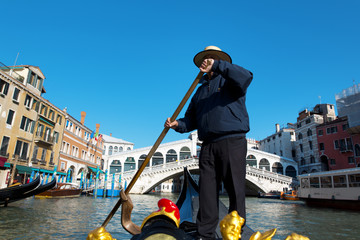 Naklejka premium Rialto Bridge and the gondolier- Venice