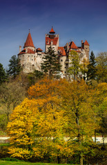 Bran Castle in autumn landscape